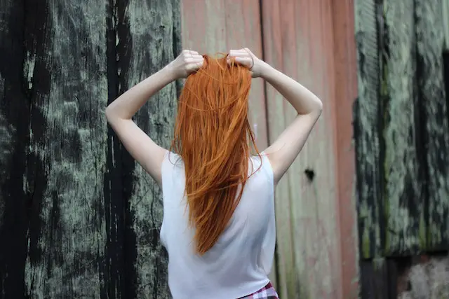 a girl with long red hair