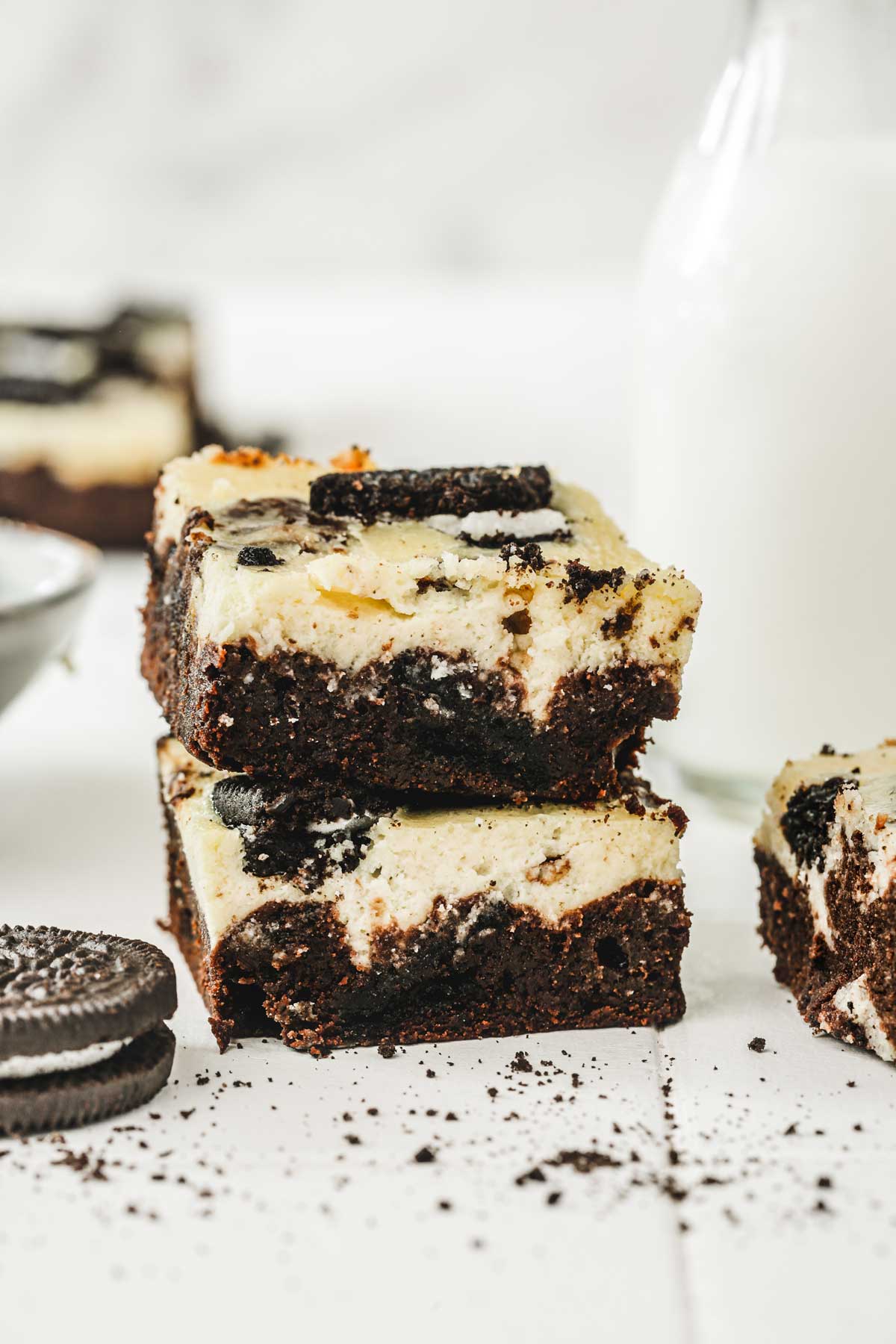 sliced oreo cheesecake brownies on a table