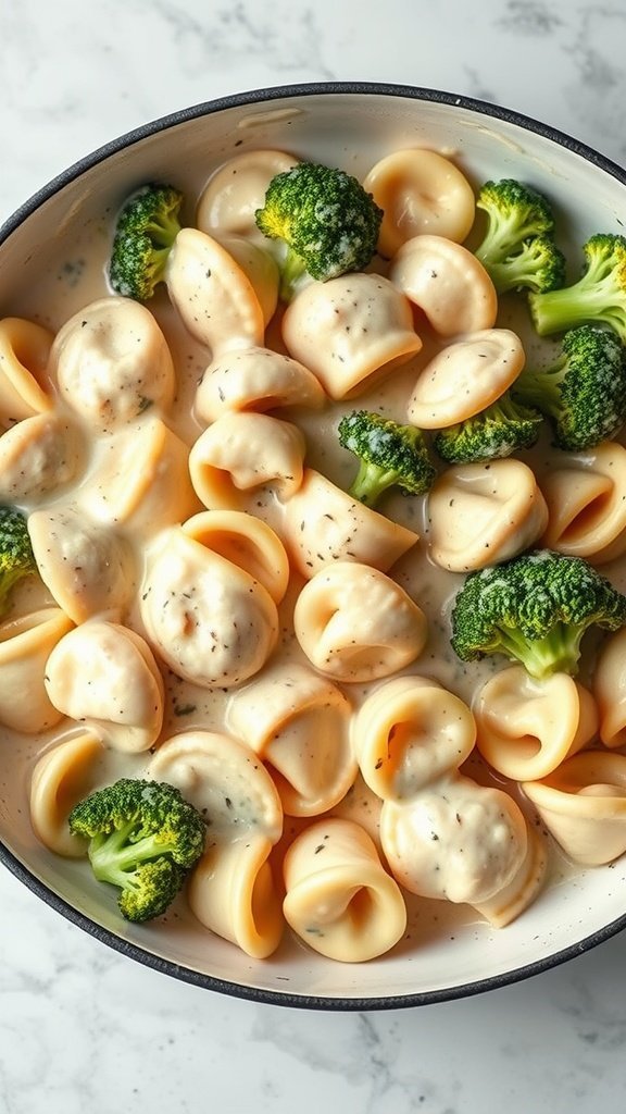 A creamy bowl of Tortellini Alfredo with broccoli.