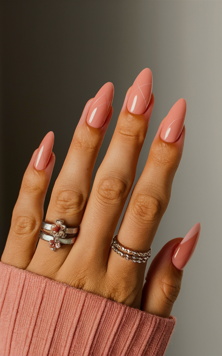 5. Coral Pink Geometric Nails